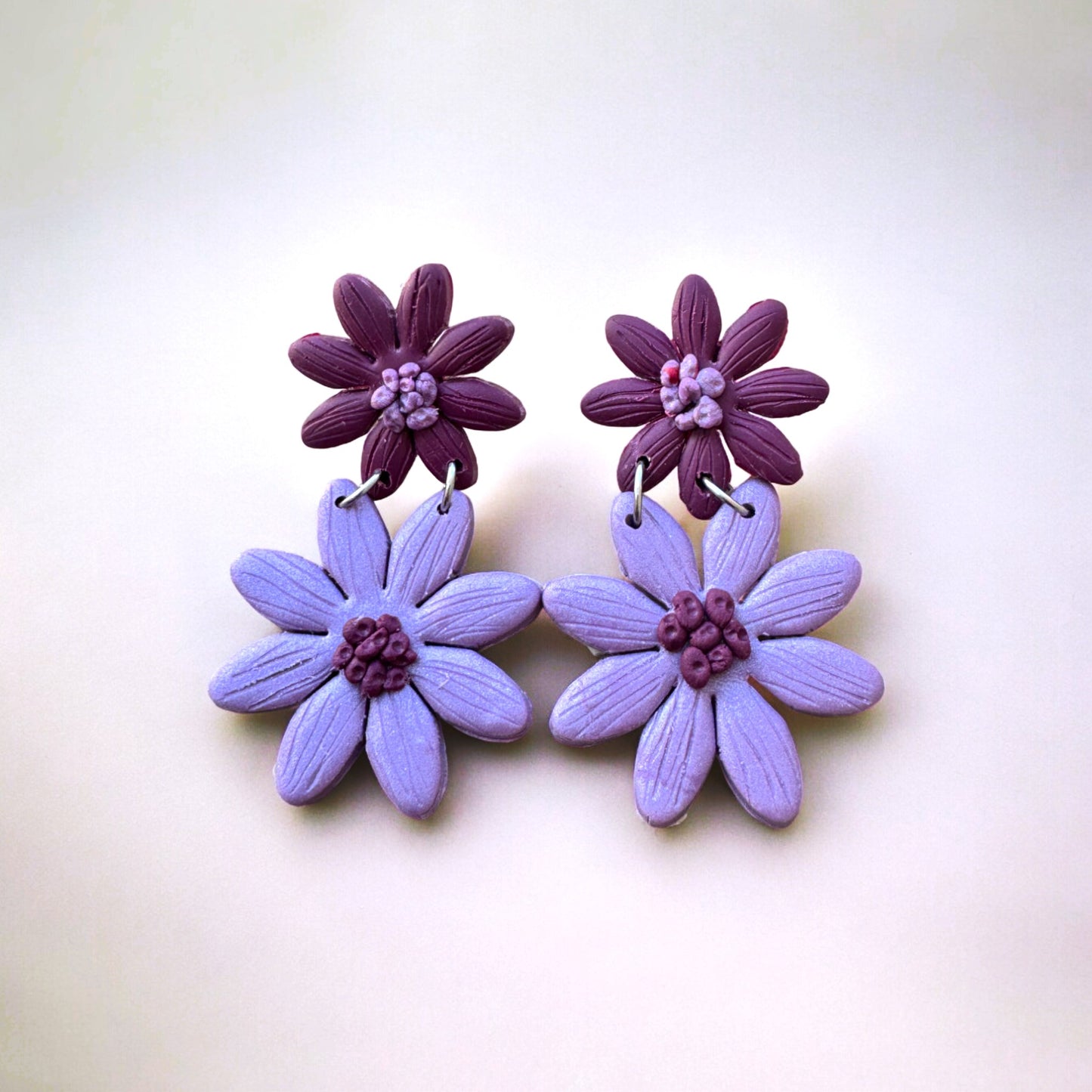 Pendientes Colección Brigitte Violeta y color vino